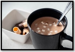 Hot cocoa beverage in a cup.